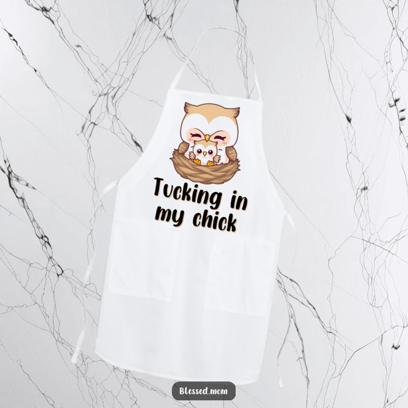 Funny apron featuring a mother owl tucking her baby owl into a nest, perfect for a mom who loves to cook.