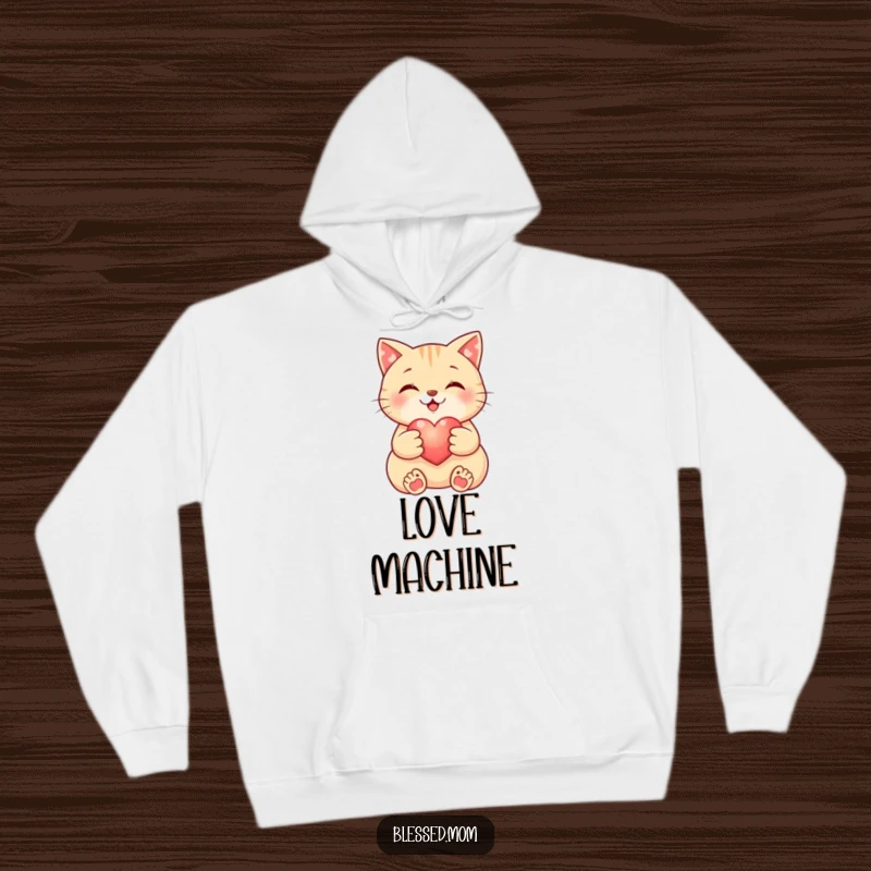 Funny Cat Hoodie: Smiling cat holds a small, glowing heart, offering warmth and comfort. An ideal funny gift for cat lovers.