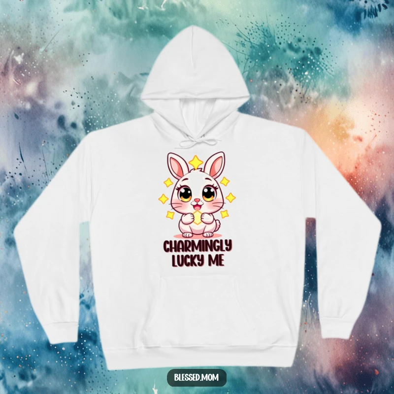 Funny hoodie featuring a cheerful rabbit character with wide eyes, holding a glowing charm, comfortable and magical apparel.