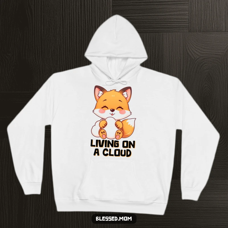 Funny fox hoodie showcasing a happy fox gently touching a soft cloud, offering cozy comfort and dreamy escape.