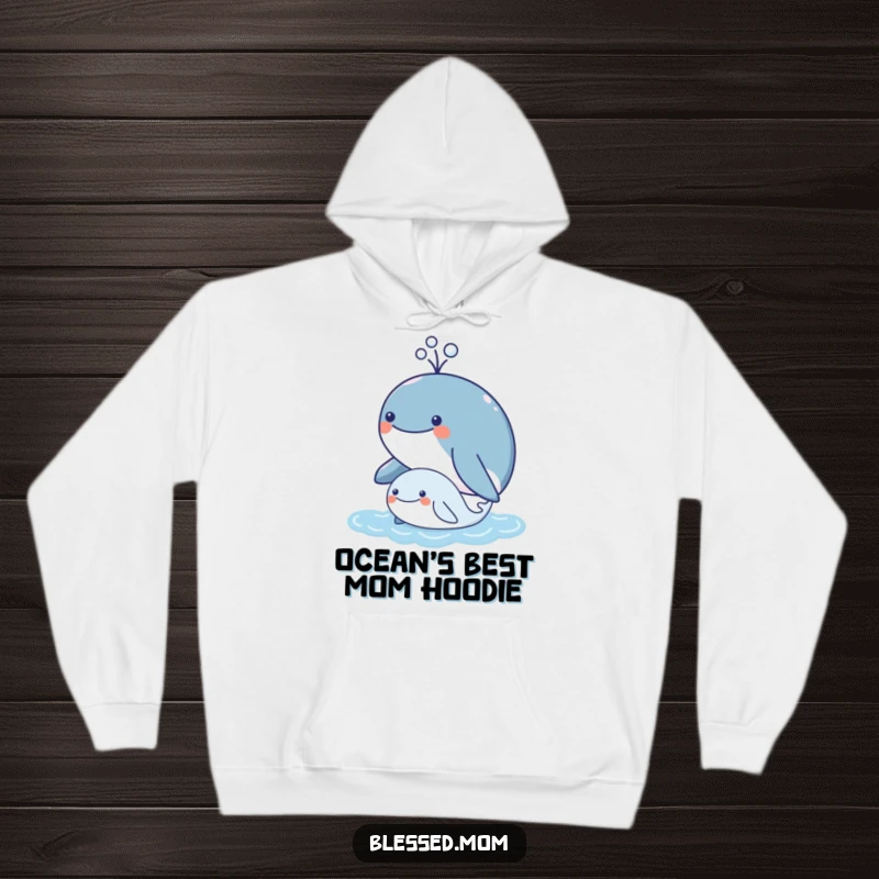 Funny kawaii mother whale spouting water over her calf, adorable ocean family warmth, cozy hoodie, perfect funny gift.