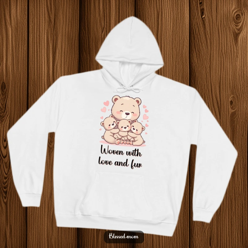 Warm bear mom hoodie with cubs in a gentle hug surrounded by glowing hearts, representing safe and loving comfort.