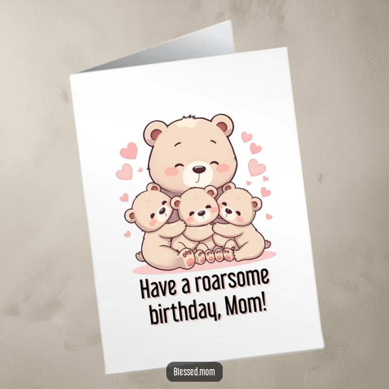 Free printable birthday card showing a mother bear hugging her cubs amidst glowing hearts.