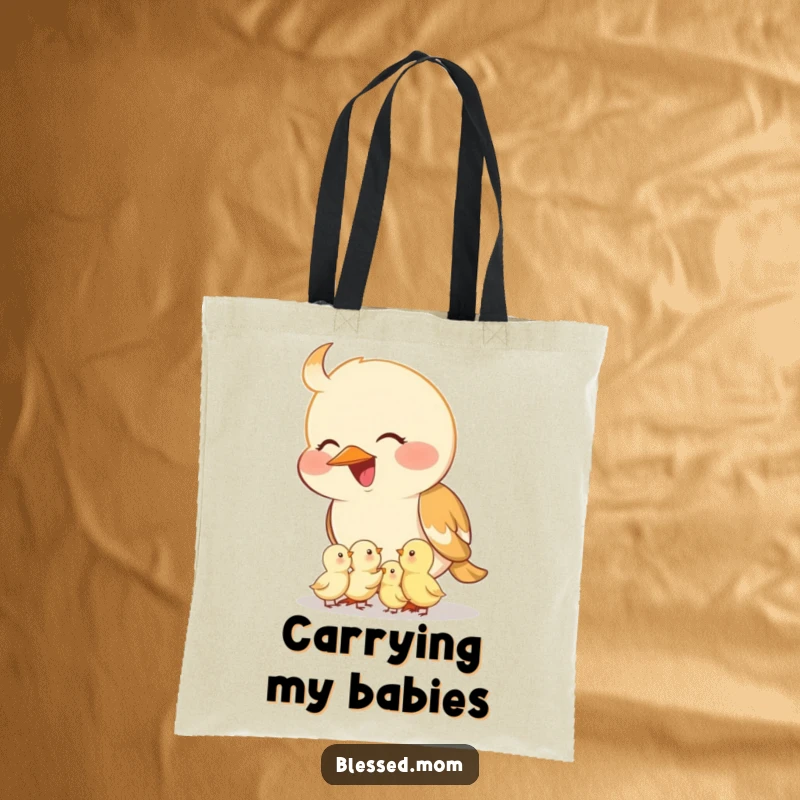Funny mama bird tote bag, featuring a smiling mother bird feeding her tiny chicks from her beak. Great for everyday use.